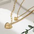 18K Gold Spiral Cross Necklace