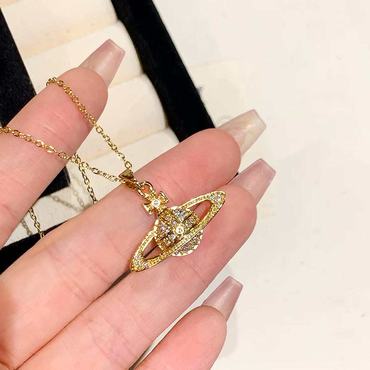 14K Gold Saturn Pendant Necklace with Diamond Accents