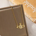 14K Gold Saturn Pendant Necklace with Diamond Accents