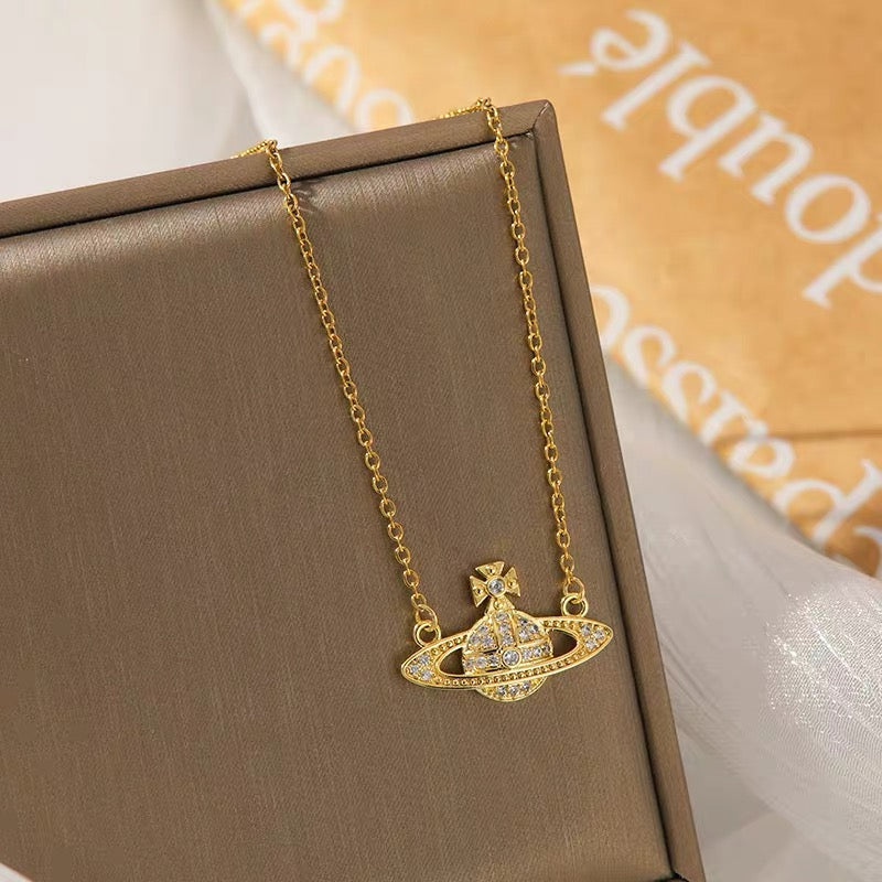 14K Gold Saturn Pendant Necklace with Diamond Accents